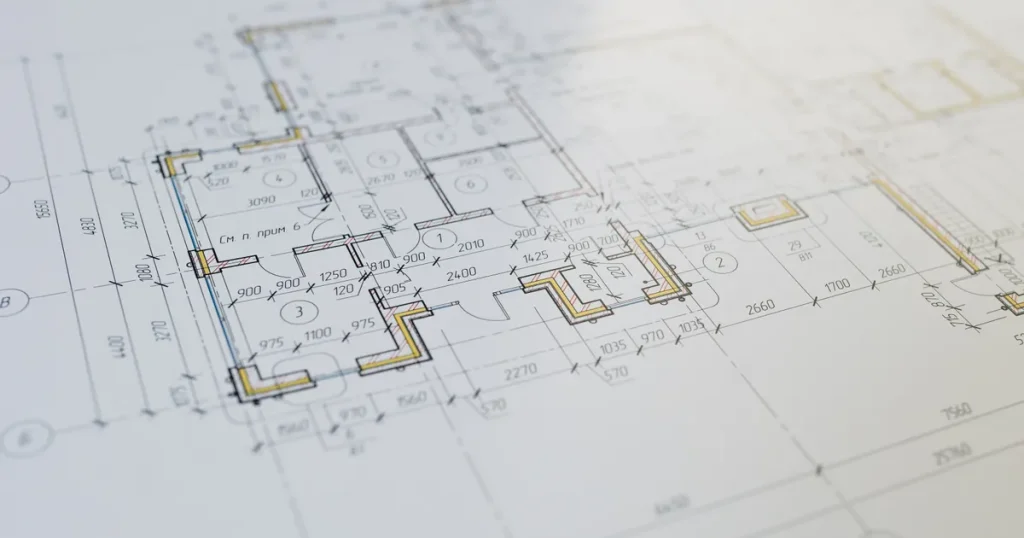 Close-up of an architectural floor plan with dimension lines and marked walls
